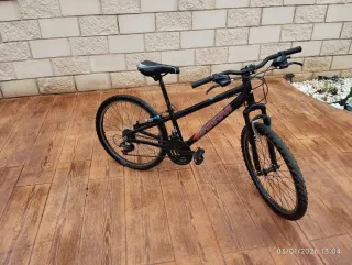 Bicicleta Newstar 24 niño/a con pata incluida.