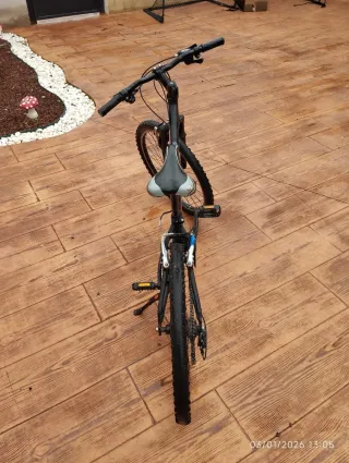 Bicicleta Newstar 24 niño/a con pata incluida.