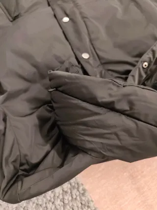 Abrigo negro de plumas mujer