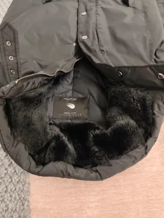 Abrigo negro de plumas mujer