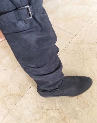Botas altas de piel negras con cremallera