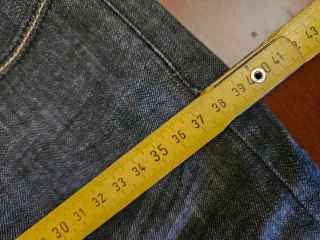 Jeans blu con risvolto