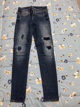 Jeans strappati blu