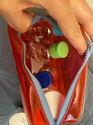 Neceser Benetton avión naranja