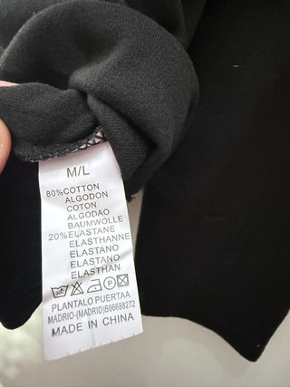 Camiseta manga larga negra con botones