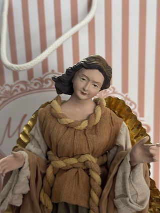 Angelo decorativo ali dorate