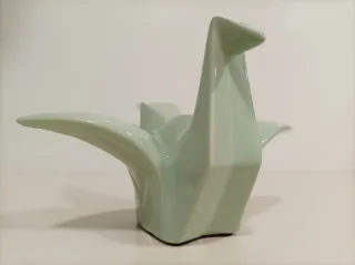 Pajarita de porcelana esmaltada