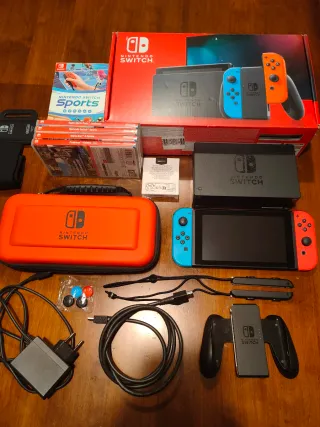 Nintendo Switch + giochi + accessori-case-sd128gb