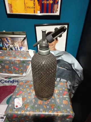 Sifón antiguo con malla de plomo