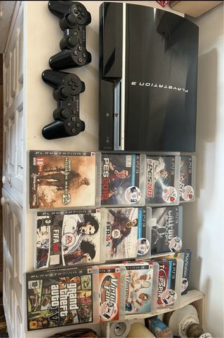 Playstation 3 con 2 mandos originales y juegos