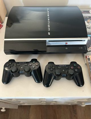 Playstation 3 con 2 mandos originales y juegos