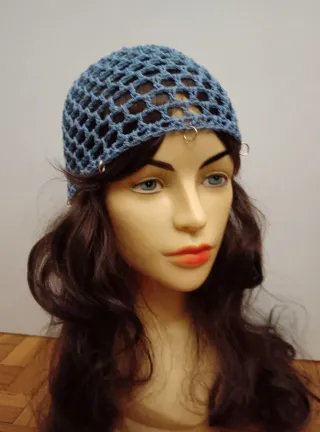 Cuffia a rete celeste con anellini dorati