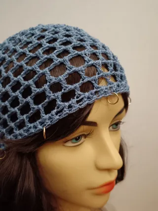 Cuffia a rete celeste con anellini dorati