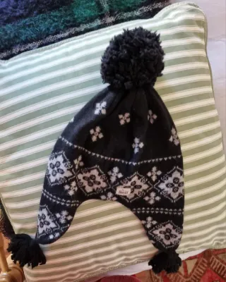 Gorro Roeckl orejeras pompón y borlas