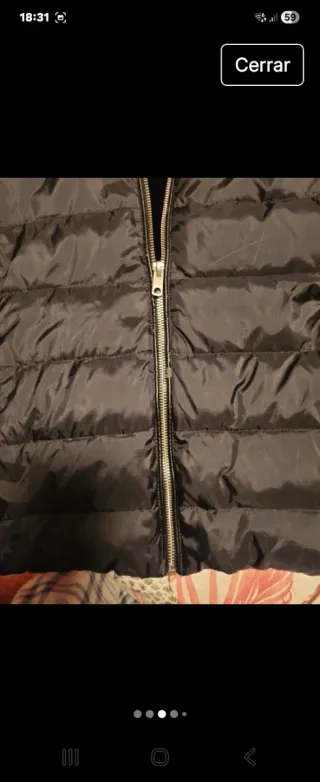 Chaqueta Zara acolchada plumas negra,forrada pelo