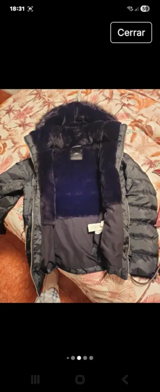 Chaqueta Zara acolchada plumas negra,forrada pelo