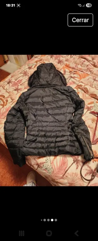 Chaqueta Zara acolchada plumas negra,forrada pelo