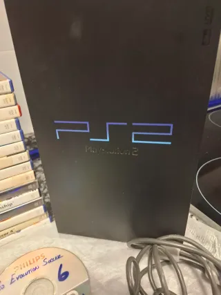 PlayStation 2 con 17 juegos y accesorios
