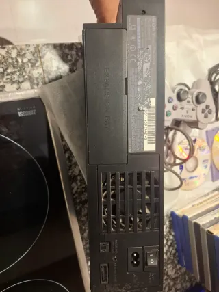 PlayStation 2 con 17 juegos y accesorios