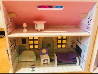 Casa delle bambole con accessori Eurekakids