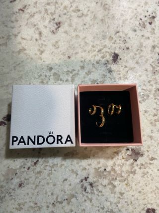 Pendientes Pandora plata bañados en oro.