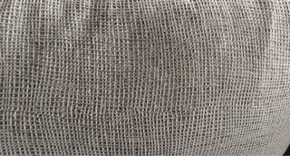 Sofá de tela gris- verde .