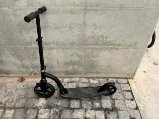 Patinete negro plegable