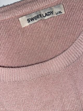 Vestito rosa con fiocchi e perline