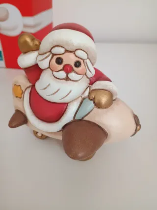 Thun Babbo Natale su Aeroplano