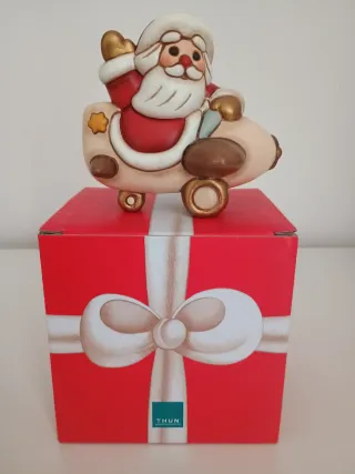 Thun Babbo Natale su Aeroplano