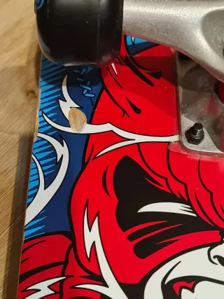 Monopatín OXELO con diseño de mono samurái