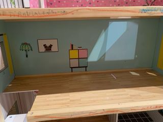 Casita de muñecas de madera