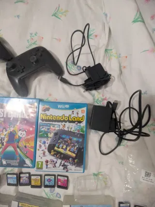 Fai offerte: lotto di console DS, PS2, Wii e giochi