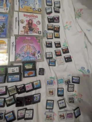 Fai offerte: lotto di console DS, PS2, Wii e giochi