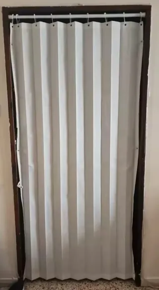 Cortina magnética plegable para puerta