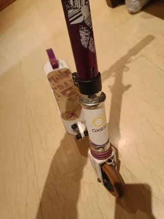 Patinete Oxelo niña plegable con suspensión