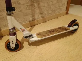 Patinete Oxelo niña plegable con suspensión