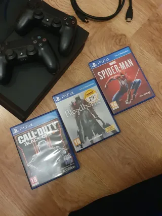 PS4 (PlayStation 4) + 2 Mandos + 3 Juegos y cables