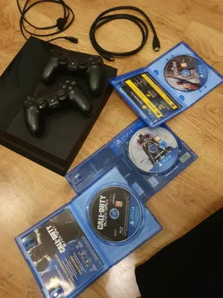 PS4 (PlayStation 4) + 2 Mandos + 3 Juegos y cables