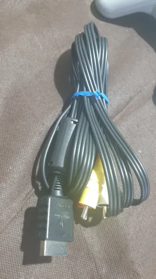 Consola Sony PlayStation 1 gris y juegos