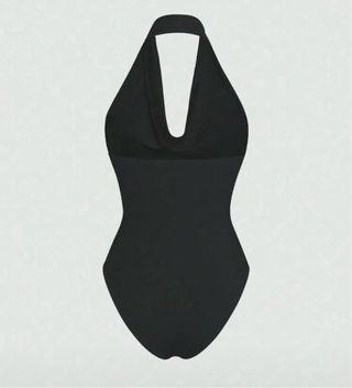 Body asimétrico escote halter negro