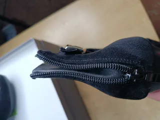 Stivaletti neri traforati con fibbia