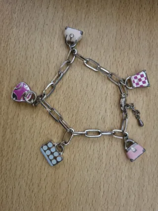Pulsera de acero de Agatha con charms de bolsos