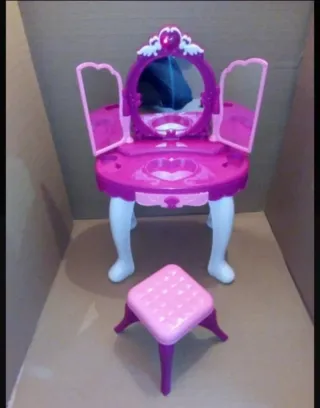 Tocador infantil de juguete rosa