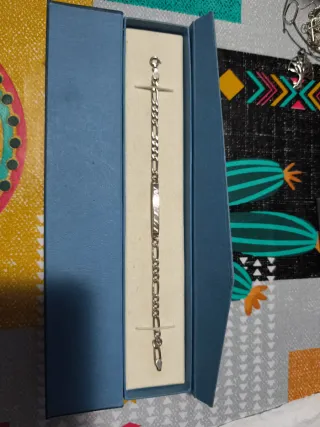 Esclava de plata con placa