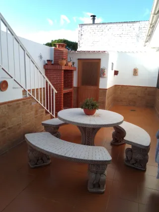 Mesa y bancos de piedra