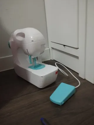 Máquina de coser de juguete