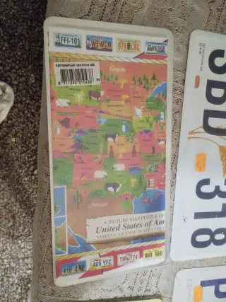 Lote placas de matrícula decorativas (varias).