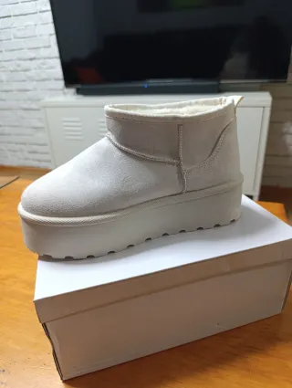 Botas de pelo beige mujer