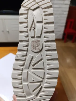 Botas de pelo beige mujer